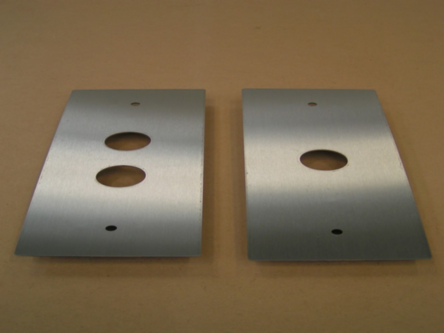 Brushed stainless lift button plates